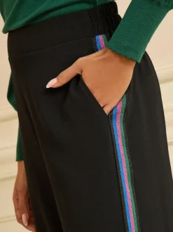 Pantalons Love & Roses métallisé à rayures latérales Jambe large