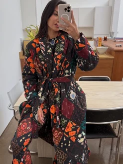 Peignoir matelassé Never Fully Dressed avec doublure en fausse fourrure