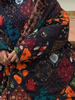 Peignoir matelassé Never Fully Dressed avec doublure en fausse fourrure