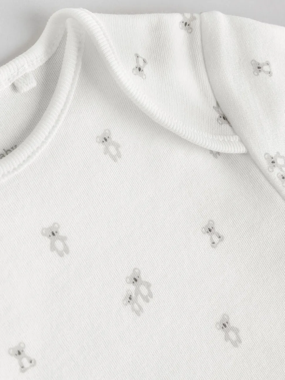 Personnage blanc - Combinaisons bébé à manches courtes