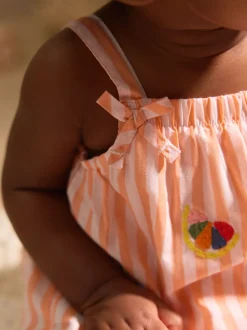 Rayé orange/blanc - Salopette tissée 100% coton bébé (0mois-3ans)