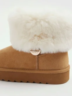 River Island Bottes doublées de fourrure avec poignets en fourrure