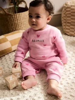 Rose imprimé cœur - Barboteuse bébé en jersey (0mois à3ans)