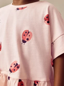 Rose motif coccinelles - T-shirt péplum à manches courtes (3mois-7ans)