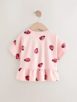 Rose motif coccinelles - T-shirt péplum à manches courtes (3mois-7ans)