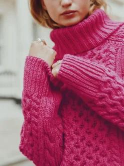 Rose vif - Pull long torsadé à col roulé en laine