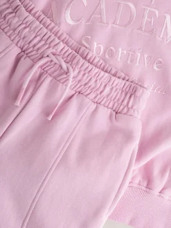 Slogan rose - Ensemble Sweat-shirt et jogging ample (3-16ans)