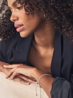 Tonalité argentée - Bracelet extensible à pierres baguettes