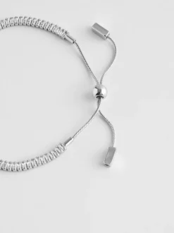 Tonalité argentée - Bracelet extensible à pierres baguettes