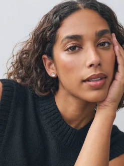 Tonalité argentée - Grands clous d'oreilles en zircon cubique