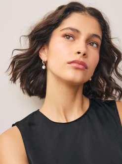 Tonalité d'or - Boucles d’oreilles créoles pavées en pierre carrée