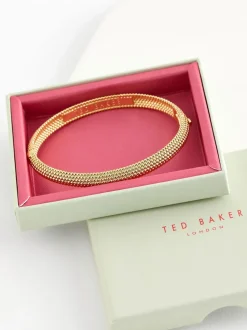 Tonalité d'or - Ted Baker DOTETT : bracelet à pois